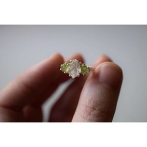 Raw peridot and clear quartz engagement ring